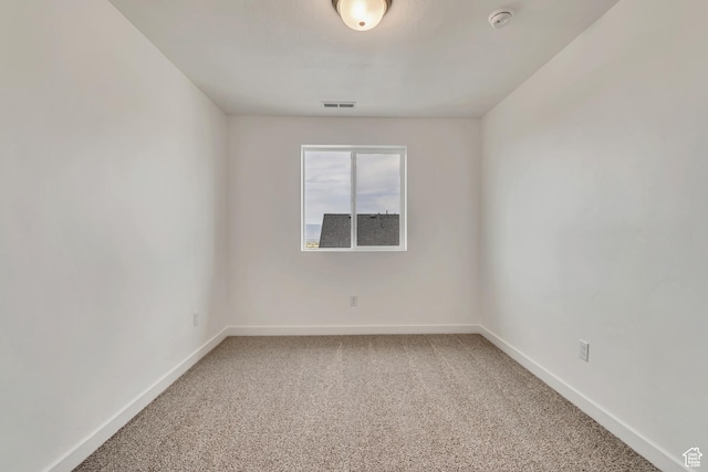 6737 S Glade Creek Dr W Unit 226, West Jordan, UT 84081 - empty room featuring a smoke detector and carpet floors