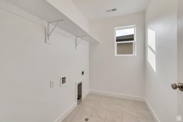 6737 S Glade Creek Dr W Unit 226, West Jordan, UT 84081 - washroom featuring electric dryer hookup, washer hookup, and light tile patterned floors