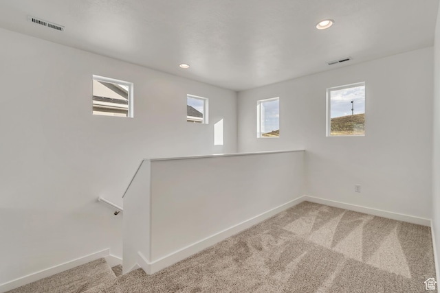 6737 S Glade Creek Dr W Unit 226, West Jordan, UT 84081 - carpeted empty room featuring baseboards and recessed lighting