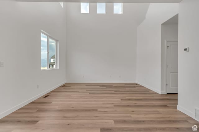 6737 S Glade Creek Dr W Unit 226, West Jordan, UT 84081 - unfurnished room featuring baseboards and light wood-style floors
