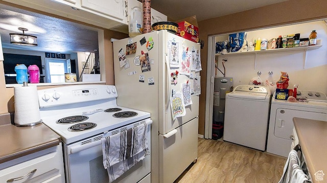 966 Mckinley Ave Unit B, Pocatello, ID 83201 - kitchen with white appliances, independent washer and dryer, white cabinetry, light wood finished floors, and water heater