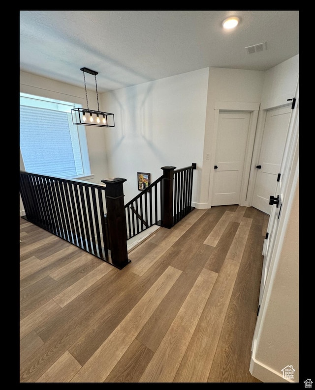 653 S 340 E, Smithfield, UT 84335 - corridor featuring an upstairs landing and wood finished floors