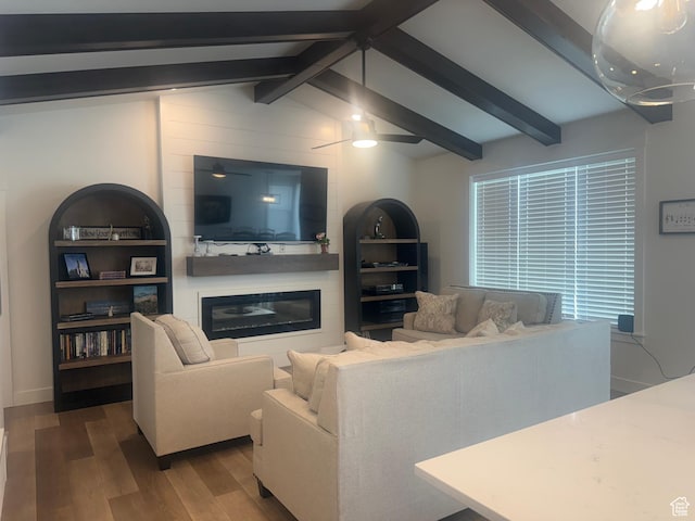 653 S 340 E, Smithfield, UT 84335 - living area with wood finished floors, a glass covered fireplace, and ceiling fan