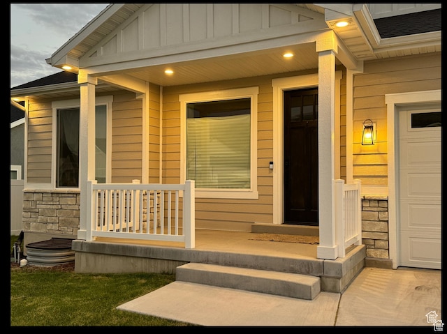 653 S 340 E, Smithfield, UT 84335 - view of exterior entry with a porch, board and batten siding, and stone siding