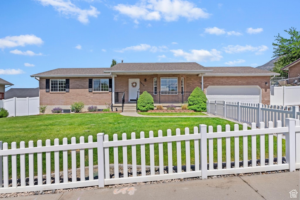 1215 Nathaniel Dr, Pleasant Grove, UT 84062 - ranch-style house featuring brick siding, a garage, and concrete driveway