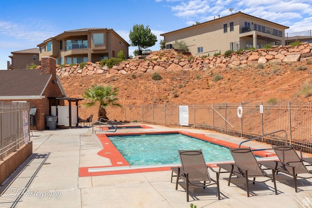 533 N Creek Ridge Cir, Washington, UT 84780 - community pool with a patio area