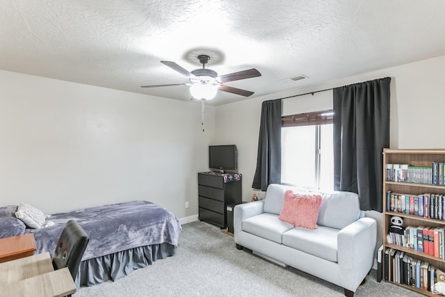 533 N Creek Ridge Cir, Washington, UT 84780 - carpeted bedroom featuring baseboards, a ceiling fan, and a textured ceiling
