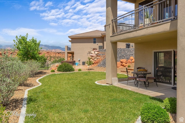 533 N Creek Ridge Cir, Washington, UT 84780 - view of yard with a balcony, a patio, and a mountain view