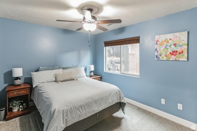 533 N Creek Ridge Cir, Washington, UT 84780 - bedroom with baseboards, carpet floors, a ceiling fan, and a textured ceiling