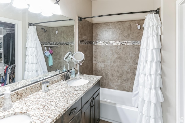 533 N Creek Ridge Cir, Washington, UT 84780 - bathroom featuring double vanity, shower / tub combo, and a walk in closet