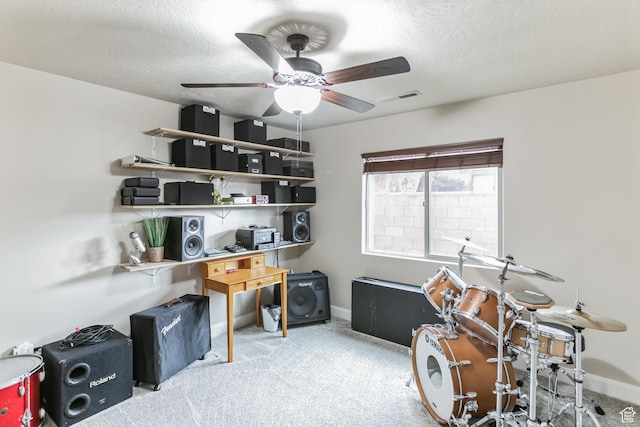 533 N Creek Ridge Cir, Washington, UT 84780 - carpeted home office featuring a ceiling fan, baseboards, and a textured ceiling