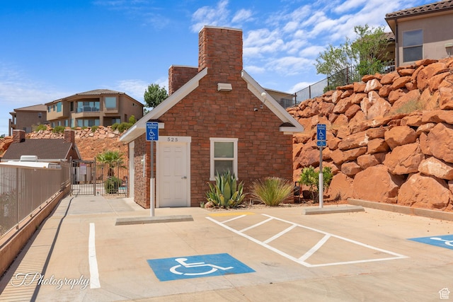 533 N Creek Ridge Cir, Washington, UT 84780 - view of parking / parking lot with a gate