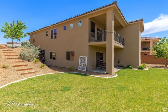 533 N Creek Ridge Cir, Washington, UT 84780 - back of house with a balcony, stucco siding, a patio, and a tiled roof