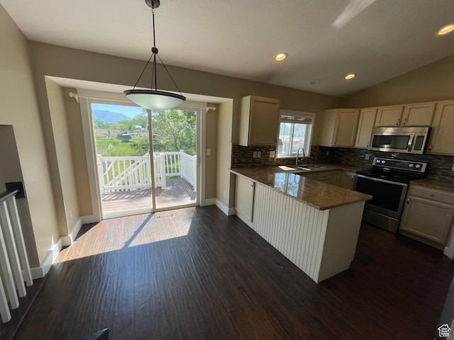 5986 S 4250 W, Roy, UT 84067 - kitchen featuring stainless steel appliances, a sink, a peninsula, tasteful backsplash, and vaulted ceiling