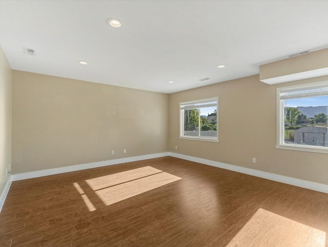 5986 S 4250 W, Roy, UT 84067 - unfurnished room with wood finished floors, baseboards, and recessed lighting