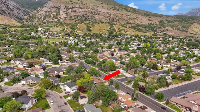 1253 Nathaniel Dr E, Pleasant Grove, UT 84062 - view of property location with a mountain backdrop and nearby suburban area