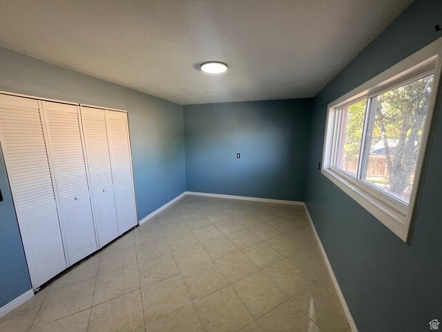 3722 S 8235 W, Magna, UT 84044 - unfurnished bedroom featuring baseboards and a closet