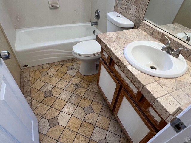 3722 S 8235 W, Magna, UT 84044 - bathroom with toilet, vanity, and bathtub / shower combination