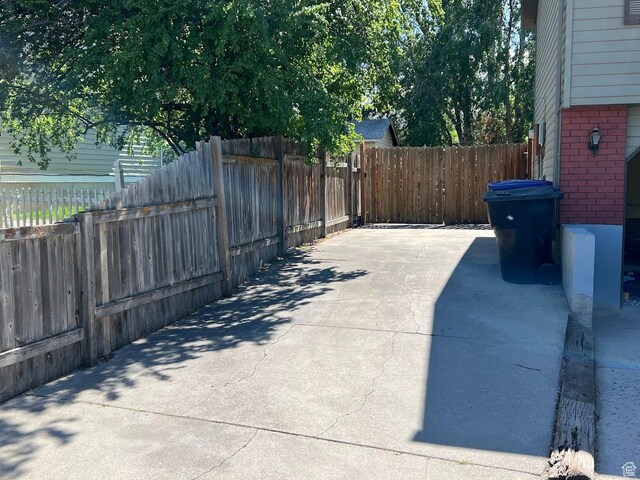 3722 S 8235 W, Magna, UT 84044 - fenced backyard featuring a patio