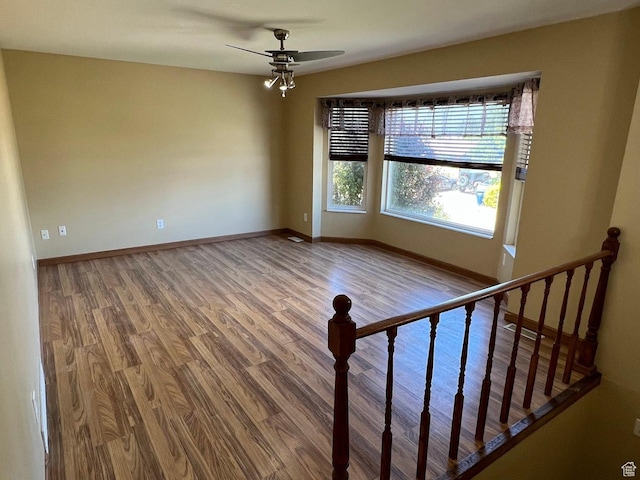 3722 S 8235 W, Magna, UT 84044 - spare room with ceiling fan, wood finished floors, and baseboards