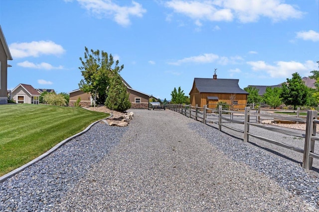 1097 E Highline Rd, Lake Point, UT 84074 - view of dirt / gravel road featuring an exterior structure