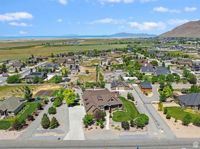 1097 E Highline Rd, Lake Point, UT 84074 - aerial perspective of suburban area featuring a mountain backdrop