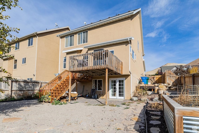 2869 W Chestnut St, Lehi, UT 84043 - rear view of property featuring a deck, stucco siding, stairway, and french doors