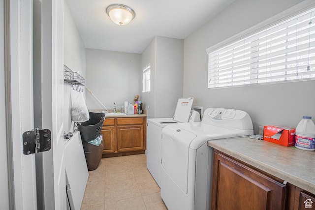 2869 W Chestnut St, Lehi, UT 84043 - washroom with washing machine and clothes dryer, cabinet space, and light tile patterned flooring