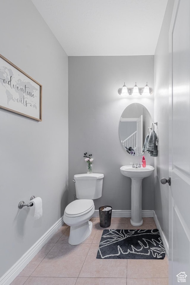 2869 W Chestnut St, Lehi, UT 84043 - half bathroom featuring toilet, tile patterned floors, and baseboards