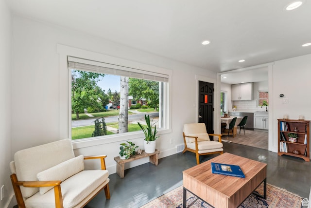 2578 E 2940 S, Salt Lake City, UT 84109 - living room with recessed lighting, dark wood-style floors, and baseboards