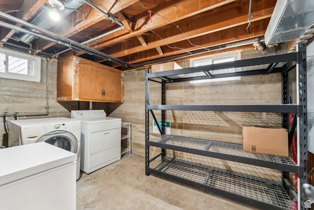 2578 E 2940 S, Salt Lake City, UT 84109 - washroom featuring cabinet space and separate washer and dryer