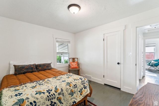 2578 E 2940 S, Salt Lake City, UT 84109 - bedroom featuring multiple windows and wood finished floors