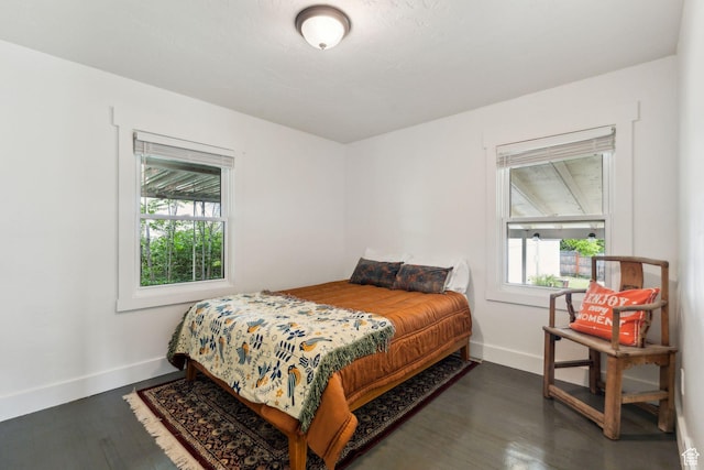2578 E 2940 S, Salt Lake City, UT 84109 - bedroom featuring baseboards and wood finished floors