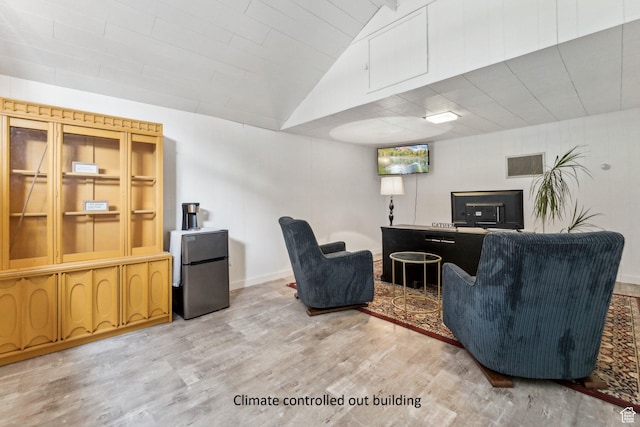 2578 E 2940 S, Salt Lake City, UT 84109 - living area with light wood finished floors and lofted ceiling