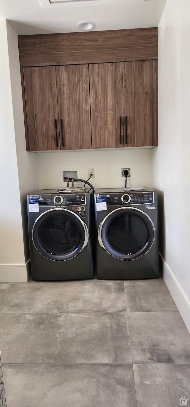 101 Crestview Cir, Park City, UT 84098 - laundry area with baseboards, separate washer and dryer, and cabinet space
