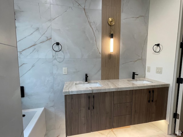 101 Crestview Cir, Park City, UT 84098 - bathroom featuring double vanity, a tub to relax in, marble finish flooring, and tile walls