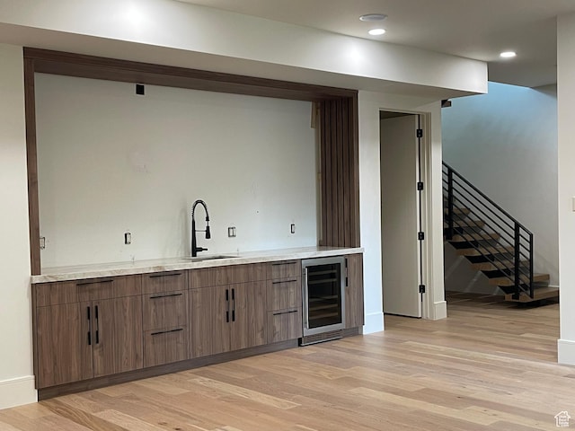 101 Crestview Cir, Park City, UT 84098 - indoor bar with beverage cooler, light wood-type flooring, stairway, baseboards, and recessed lighting