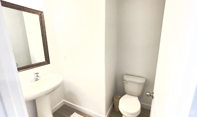 981 E Mecham Ave, Layton, UT 84040 - half bathroom with wood finished floors, toilet, and baseboards