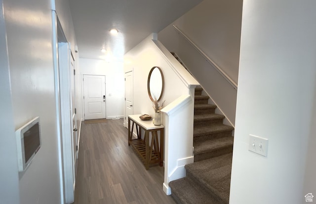 981 E Mecham Ave, Layton, UT 84040 - corridor with wood finished floors, stairs, heating unit, and baseboards