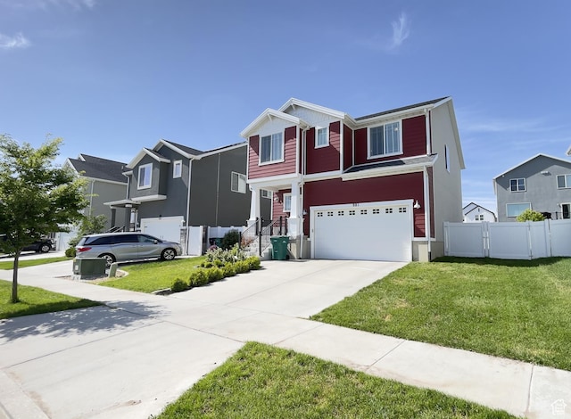 981 E Mecham Ave, Layton, UT 84040 - traditional-style home with an attached garage, concrete driveway, and a residential view