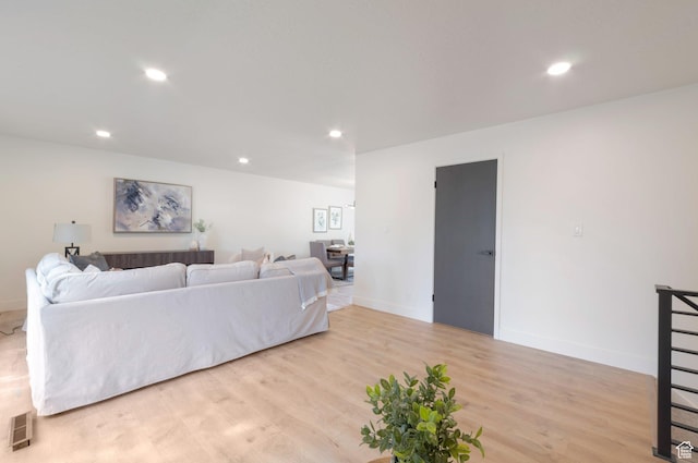 1416 N Eyrie Dr E, Ogden, UT 84404 - living area with light wood-style flooring, recessed lighting, and baseboards