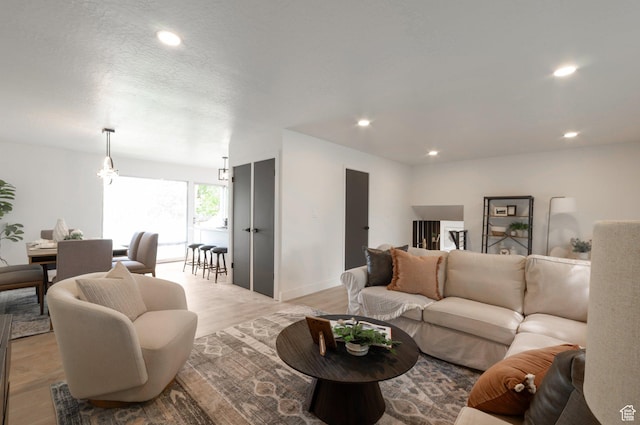 1416 N Eyrie Dr E, Ogden, UT 84404 - living area with light wood-style flooring, recessed lighting, and baseboards