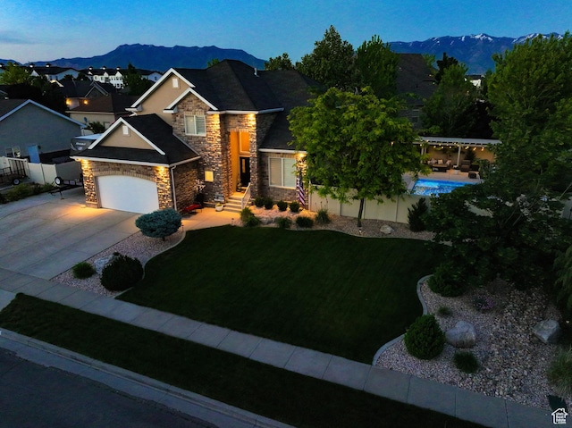 1901 S 1375 W, Syracuse, UT 84075 - craftsman-style home with stone siding, a mountain view, and concrete driveway