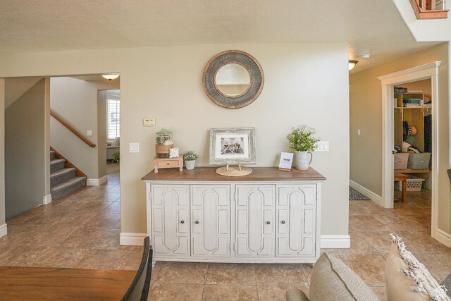 1901 S 1375 W, Syracuse, UT 84075 - corridor featuring stairs, baseboards, and light tile patterned floors