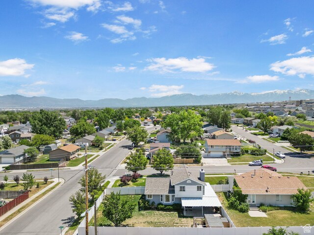 3774 S 8370 W, Magna, UT 84044 - aerial perspective of suburban area with a mountainous background