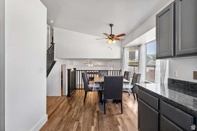 3774 S 8370 W, Magna, UT 84044 - dining room with ceiling fan, wood finished floors, and stairway