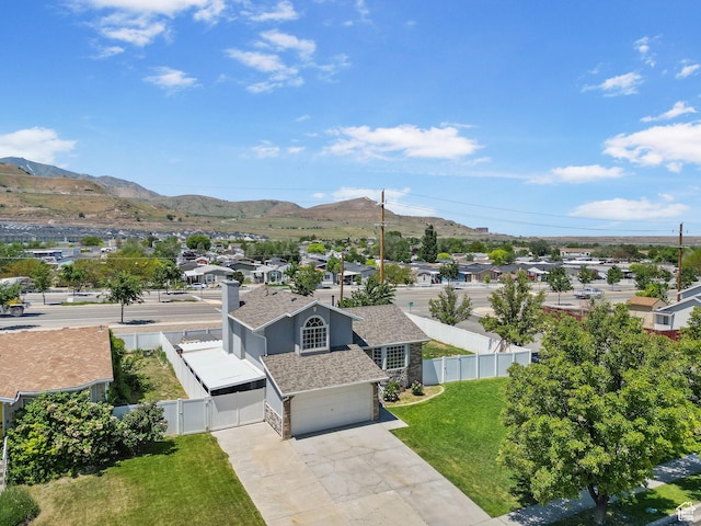 3774 S 8370 W, Magna, UT 84044 - aerial perspective of suburban area featuring a mountain backdrop
