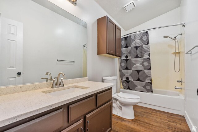 3774 S 8370 W, Magna, UT 84044 - bathroom featuring toilet, vanity, shower / tub combo with curtain, wood finished floors, and vaulted ceiling