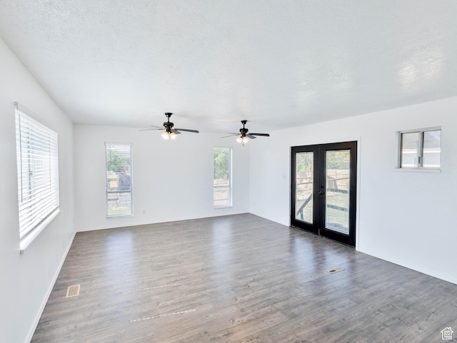 35 W 200 N, Aurora, UT 84620 - unfurnished room with french doors, wood finished floors, baseboards, and a ceiling fan