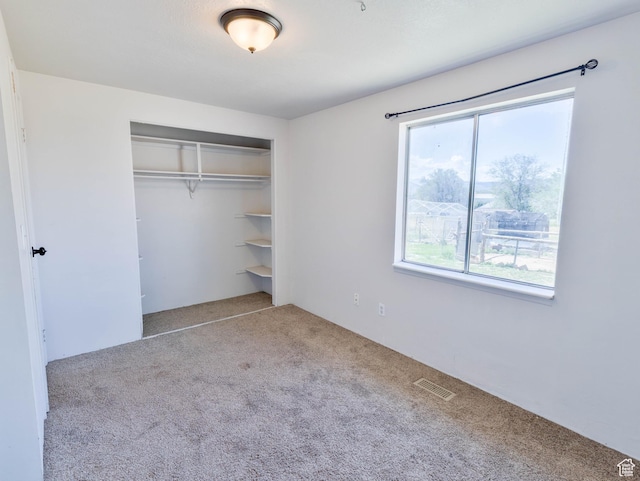 35 W 200 N, Aurora, UT 84620 - unfurnished bedroom featuring carpet flooring and a closet